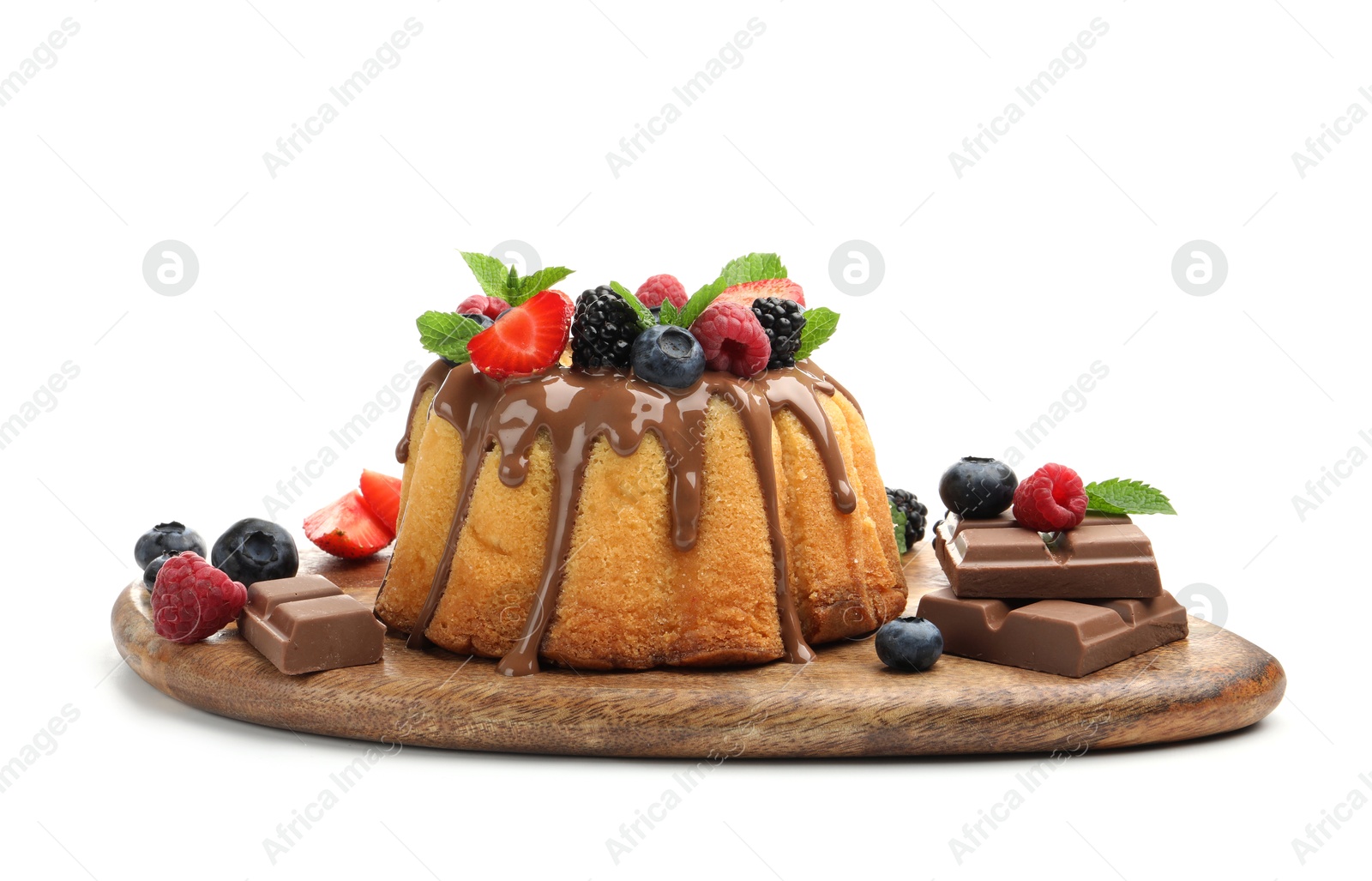 Tasty Bundt cake with berries, chocolate and mint isolated on white Photo of Tasty Bundt cake with berries, chocolate and mint isolated on white