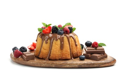 Photo of Tasty Bundt cake with berries, chocolate and mint isolated on white
