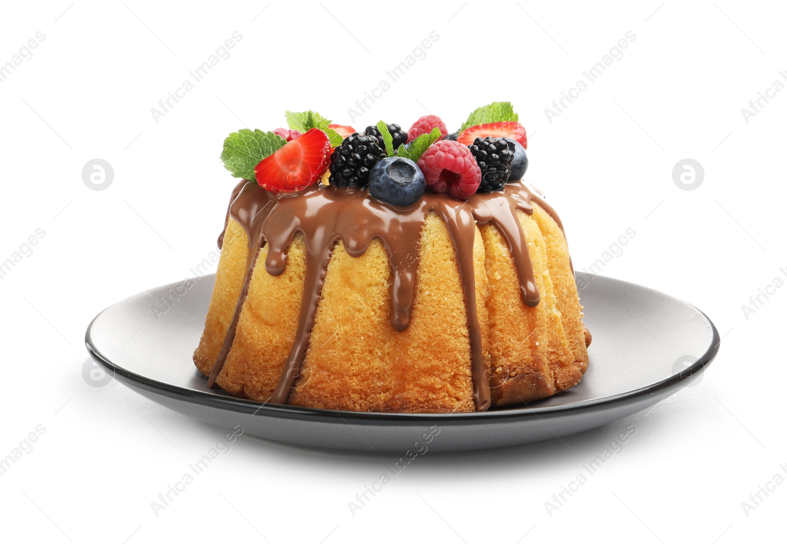 Tasty Bundt cake with berries, chocolate and mint isolated on white Photo of Tasty Bundt cake with berries, chocolate and mint isolated on white