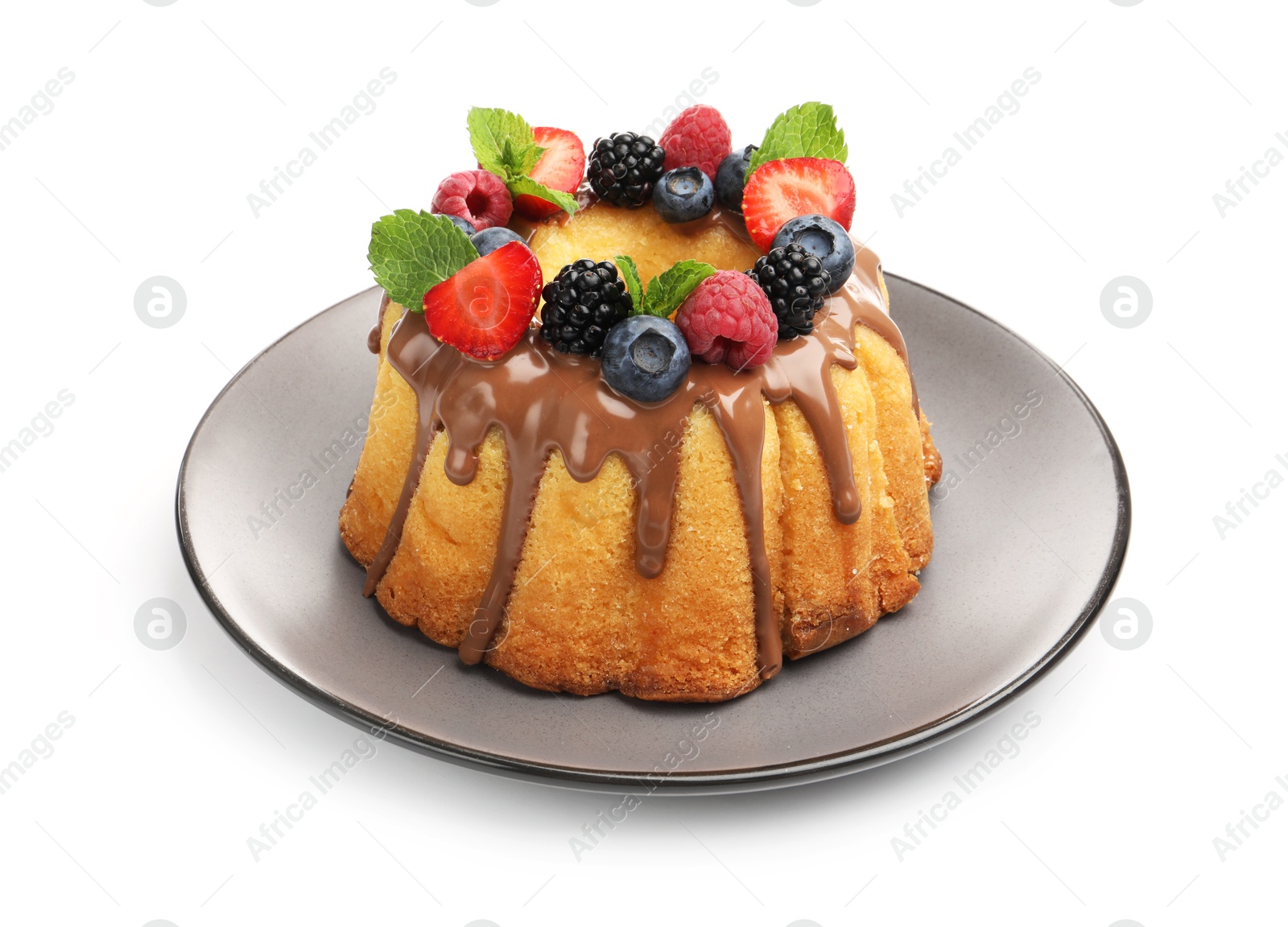 Tasty Bundt cake with berries, chocolate and mint isolated on white Photo of Tasty Bundt cake with berries, chocolate and mint isolated on white