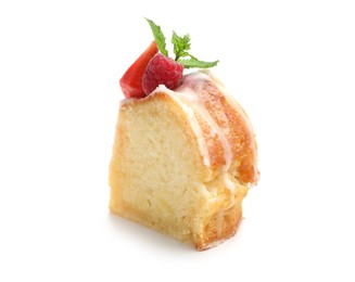 Photo of Piece of delicious bundt cake with berries, glaze and mint isolated on white