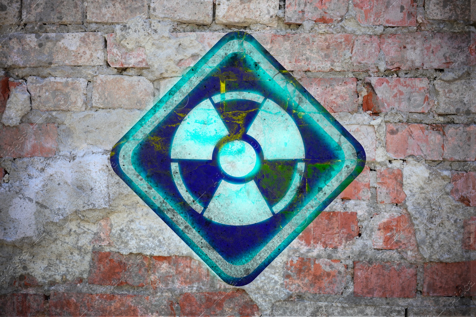 Bright radioactive sign on old brick wall. Radiological pollution Image of Bright radioactive sign on old brick wall. Radiological pollution