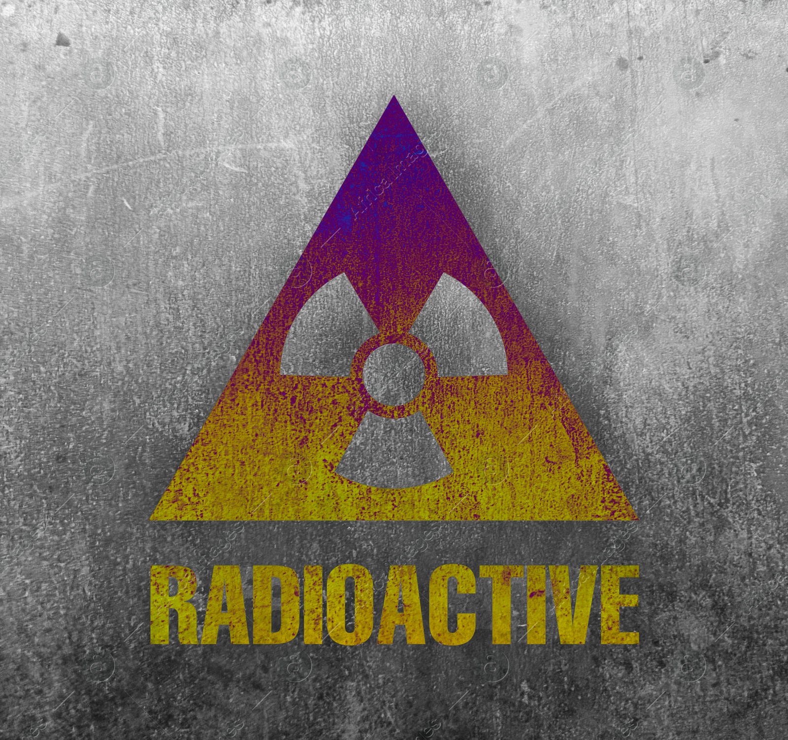 Image of Radioactive sign on grey textured surface. Radiological pollution
