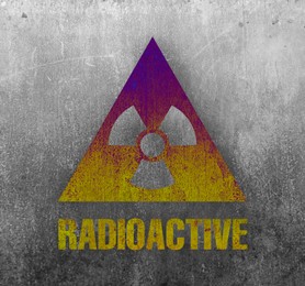 Image of Radioactive sign on grey textured surface. Radiological pollution
