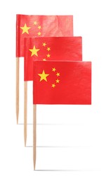 Image of Small paper flags of China on white background