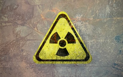 Image of Radioactive sign on textured surface. Radiological pollution