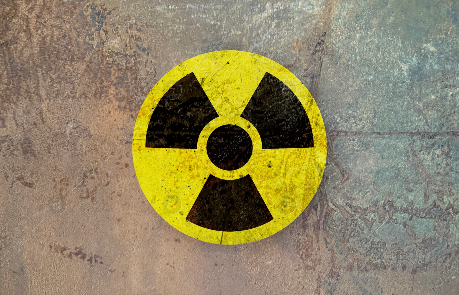 Image of Radioactive sign on textured surface. Radiological pollution
