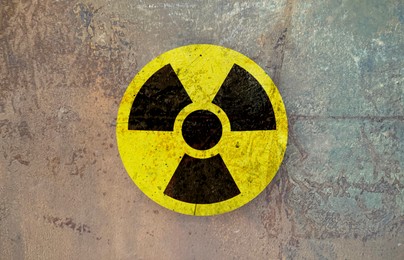 Image of Radioactive sign on textured surface. Radiological pollution
