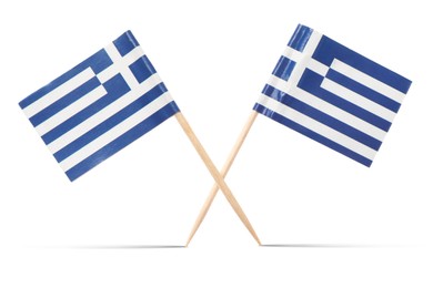 Image of Small paper flags of Greece on white background