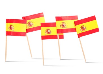 Image of Small paper flags of Spain on white background