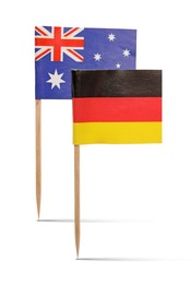 Image of Small paper flags of Germany and Australia on white background