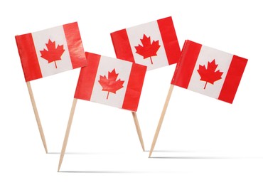 Image of Small paper flags of Canada on white background
