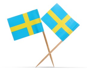 Image of Small paper flags of Sweden on white background