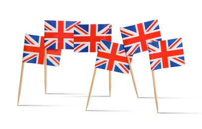 Image of Small paper flags of United Kingdom on white background