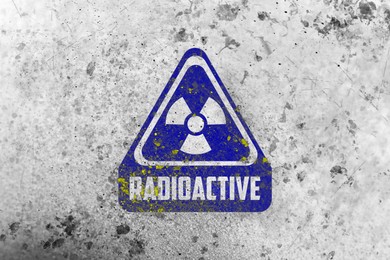 Image of Radioactive sign on white textured surface. Radiological pollution