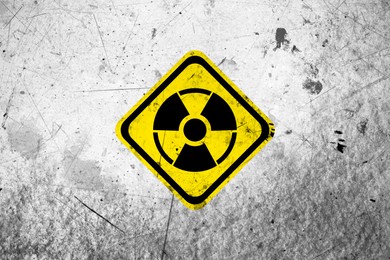 Image of Radioactive sign on white textured surface. Radiological pollution