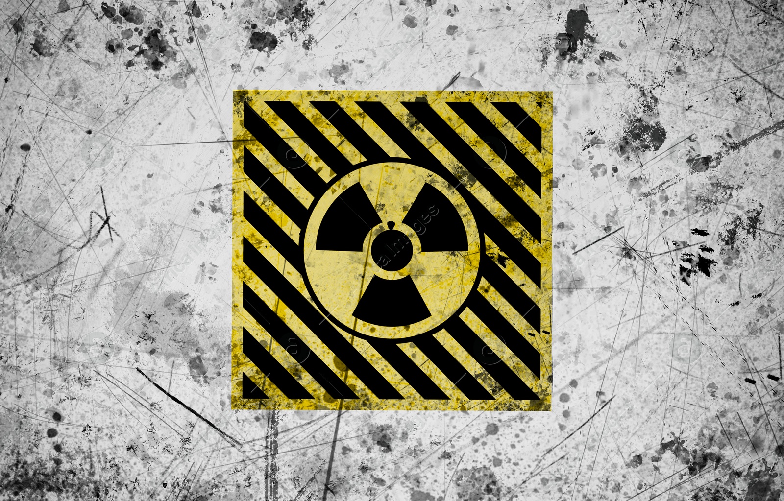 Image of Radioactive sign on white textured surface. Radiological pollution