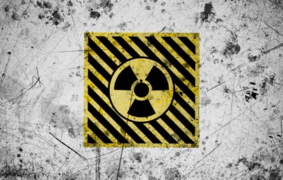 Image of Radioactive sign on white textured surface. Radiological pollution