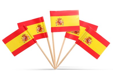 Image of Small paper flags of Spain on white background