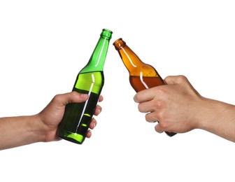 Image of Men clinking their bottles of beer together against white background