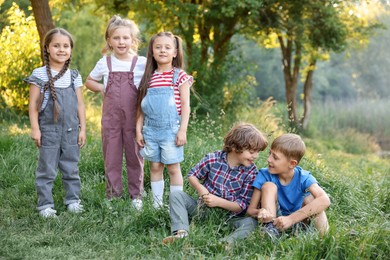 Photo of Group of children spending time in nature