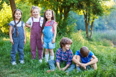 Photo of Group of children spending time in nature