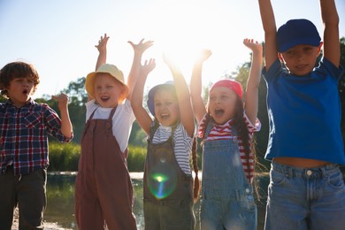 Photo of Happy children in nature on sunny day