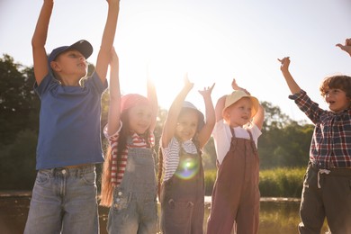 Photo of Happy children in nature on sunny day
