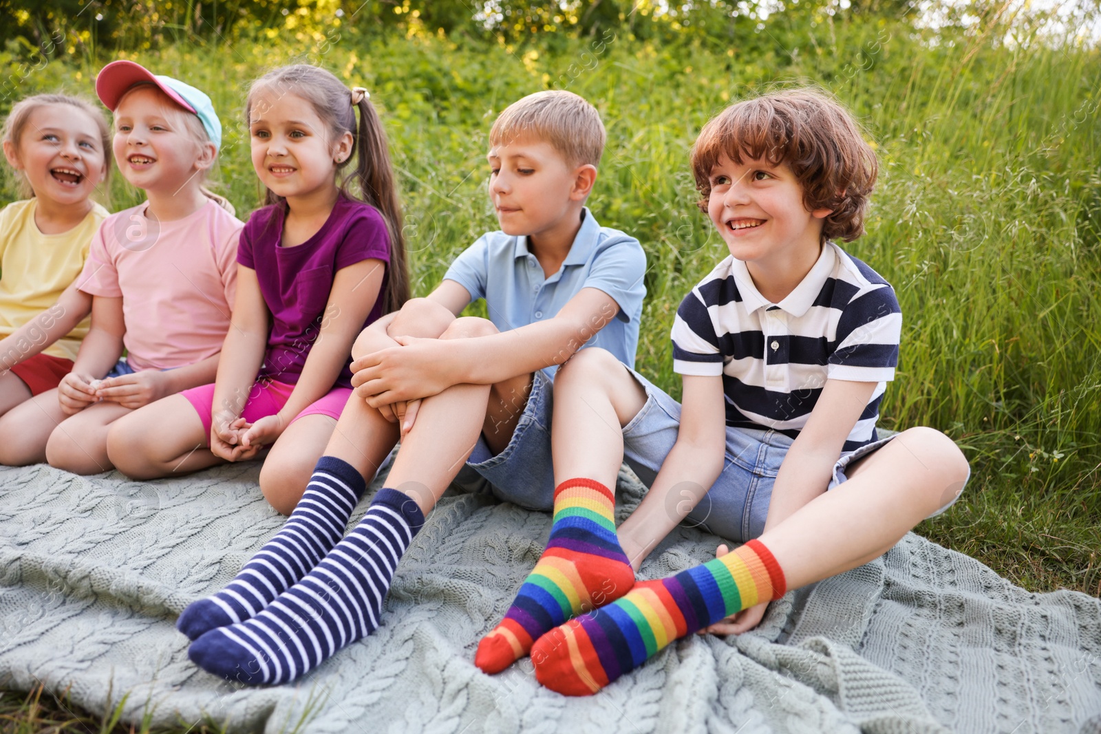 Children spending time in nature on summer day Photo of Children spending time in nature on summer day
