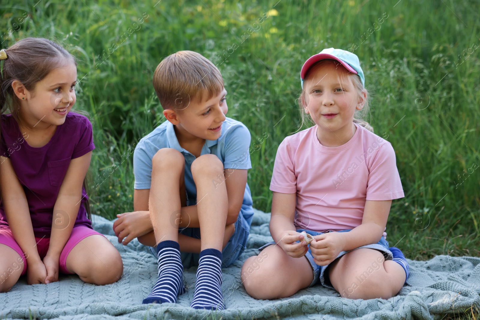 Children spending time in nature on summer day Photo of Children spending time in nature on summer day