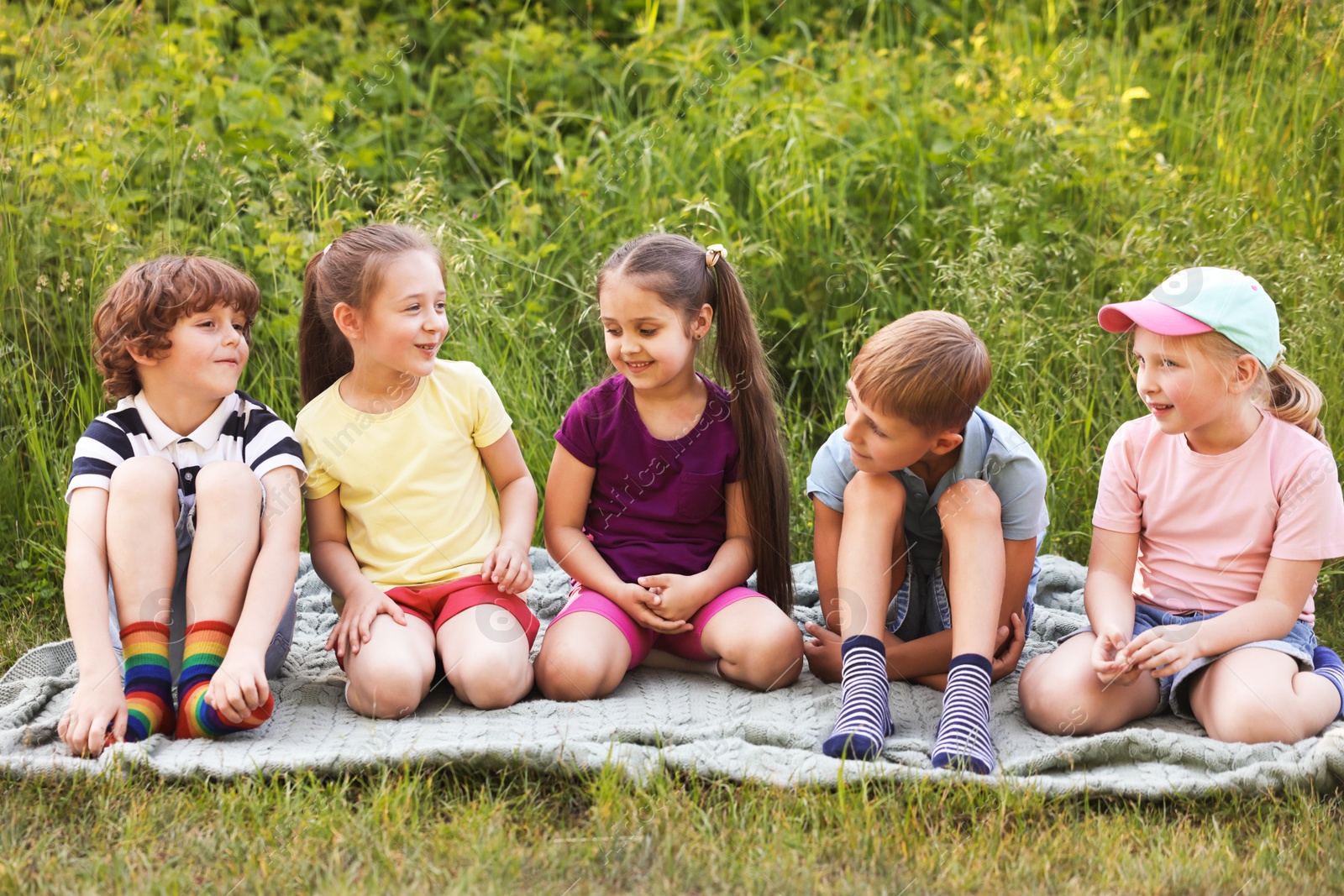 Children spending time in nature on summer day Photo of Children spending time in nature on summer day