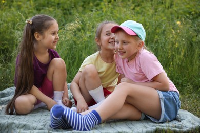 Photo of Children spending time in nature on summer day
