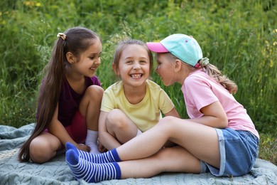Photo of Children spending time in nature on summer day