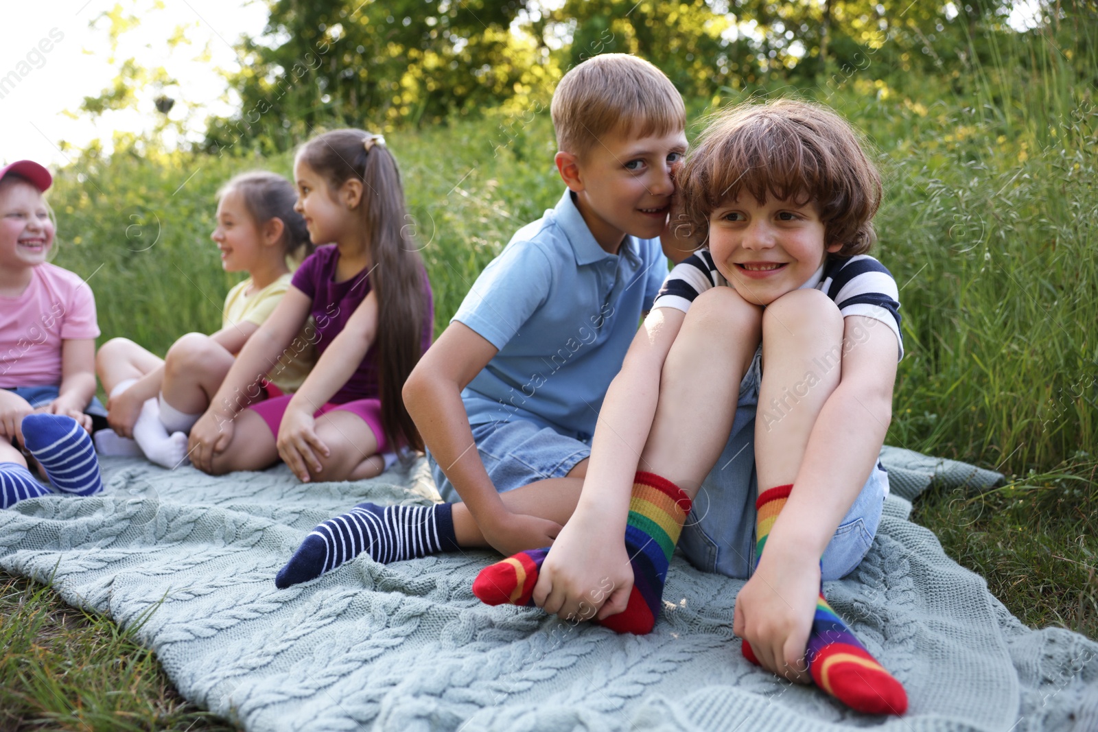 Children spending time in nature on summer day Photo of Children spending time in nature on summer day