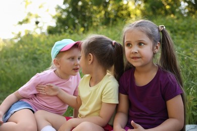 Photo of Children spending time in nature on summer day