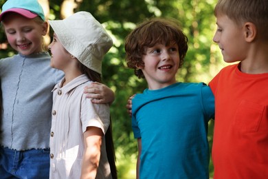 Photo of Happy children spending time together in nature