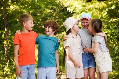 Photo of Happy children spending time together in nature