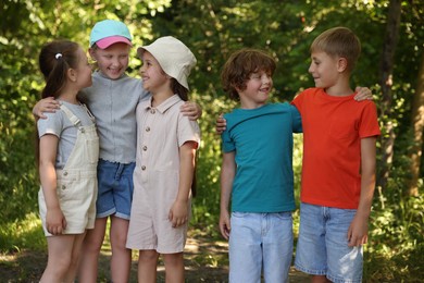 Photo of Happy children spending time together in nature