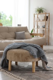 Photo of Stylish sofa and other furniture in living room. Interior design