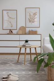 Photo of Stylish coffee table and other furniture in living room. Interior design