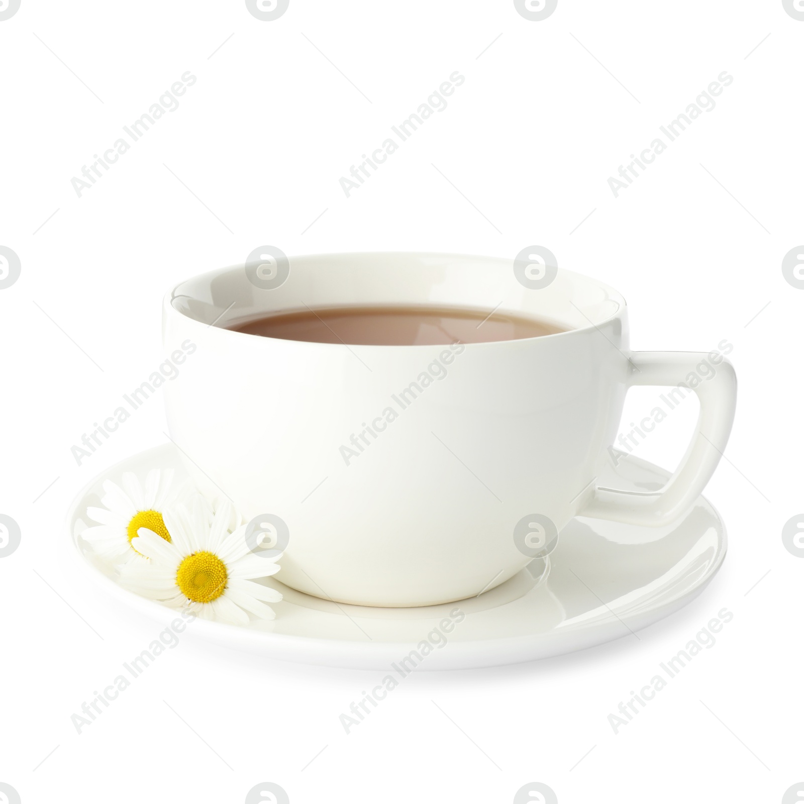 Photo of Aromatic tea in cup and chamomile flowers isolated on white