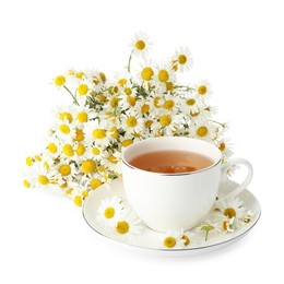 Photo of Aromatic tea in cup and chamomile flowers isolated on white