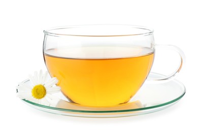 Photo of Aromatic tea in glass cup and chamomile flowers isolated on white