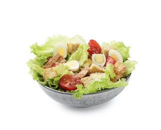 Photo of Delicious salad with croutons, chicken, quail eggs, tomato and cheese in bowl isolated on white