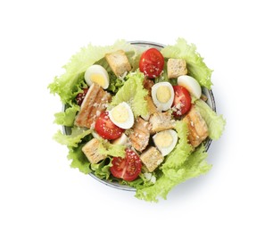 Photo of Delicious salad with croutons, chicken, quail eggs, tomato and cheese in bowl isolated on white, top view