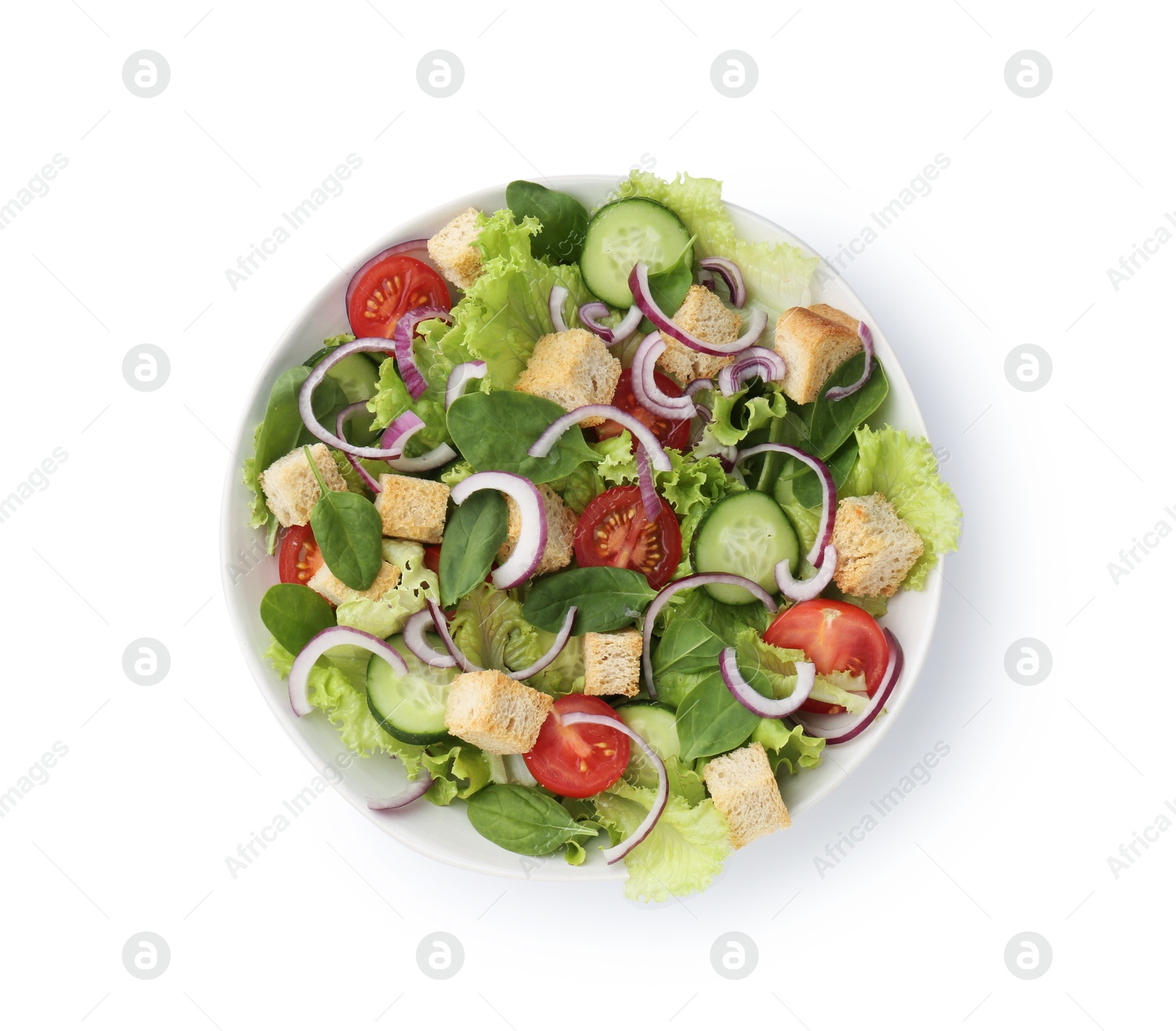 Photo of Delicious salad with croutons and vegetables isolated on white, top view
