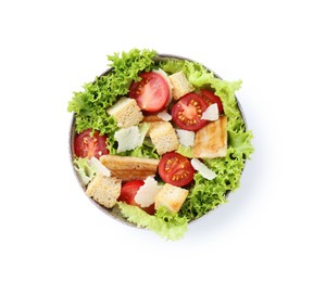 Photo of Delicious salad with croutons, chicken, tomatoes, cheese and lettuce isolated on white, top view
