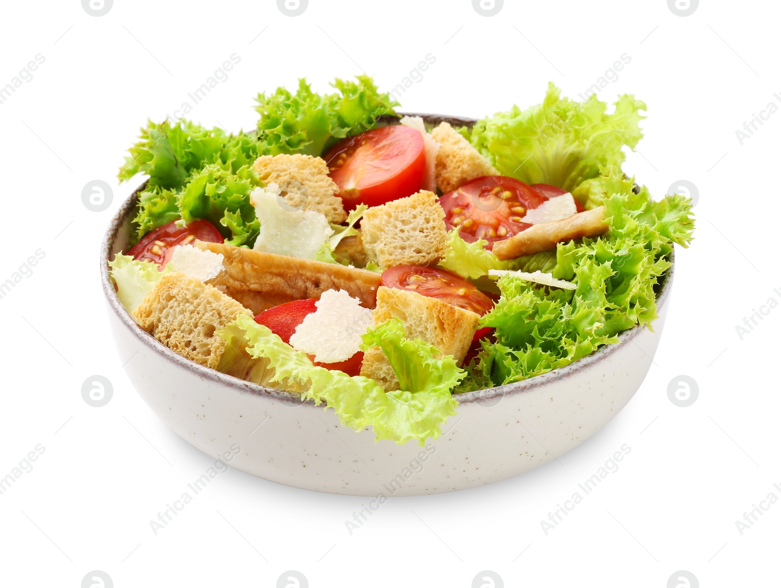 Photo of Delicious salad with croutons, chicken, tomatoes, cheese and lettuce isolated on white