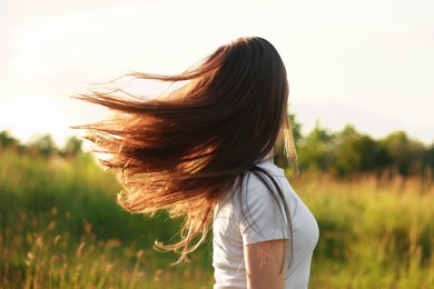 Photo of Feeling freedom. Woman enjoying time in nature