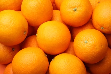 Photo of Fresh ripe oranges as background, top view